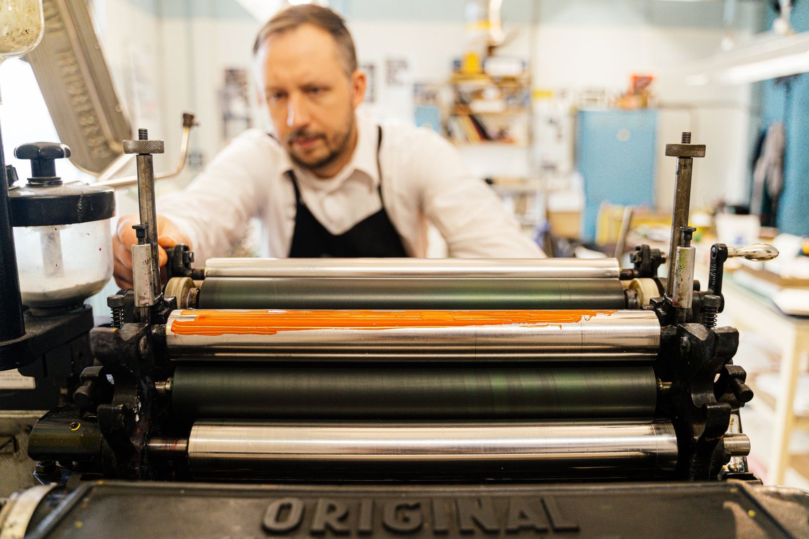 Colourful ink rollers on a letterpress