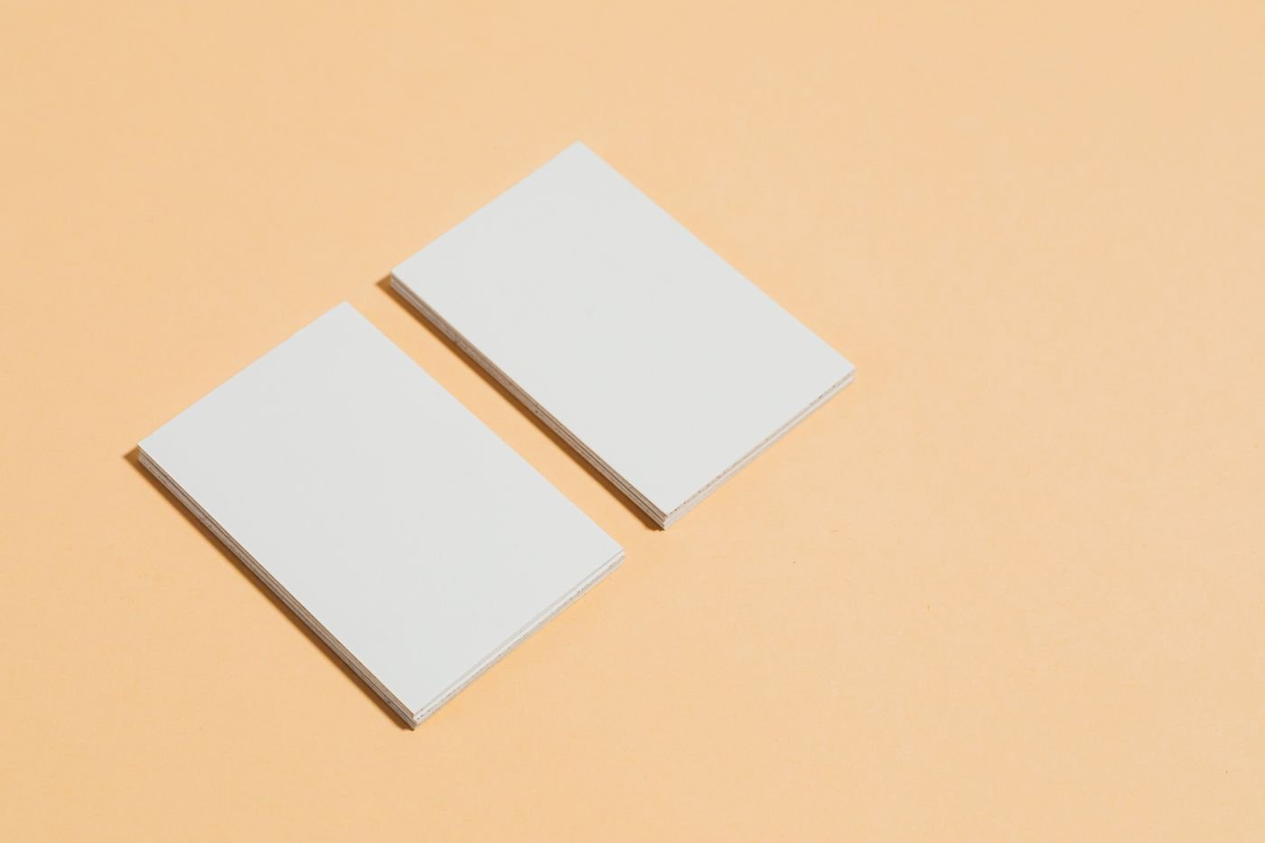 Home Brand stationery and business cards laid out in colour