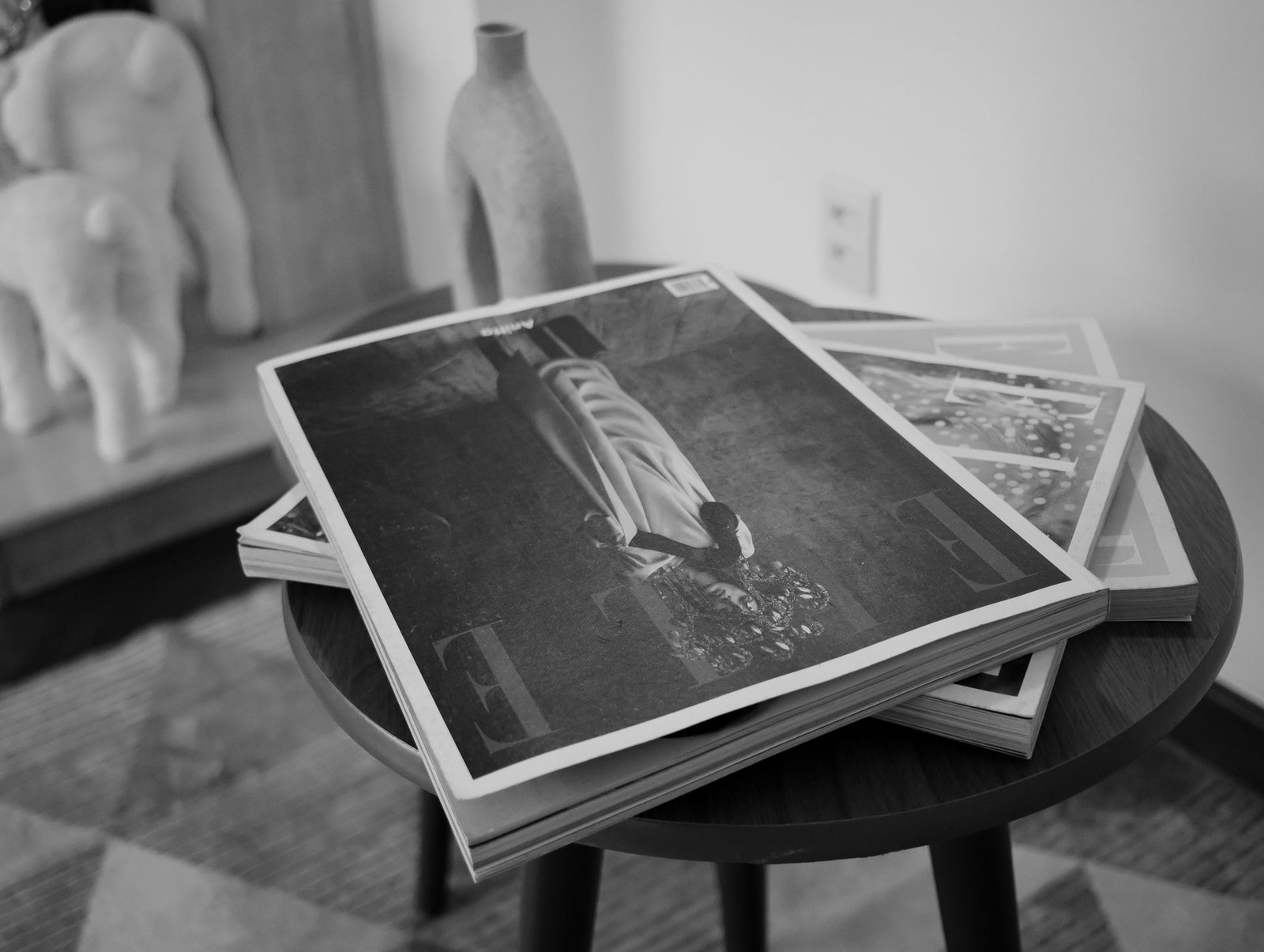 Portfolio Stack of printed magazines photographed in black and white