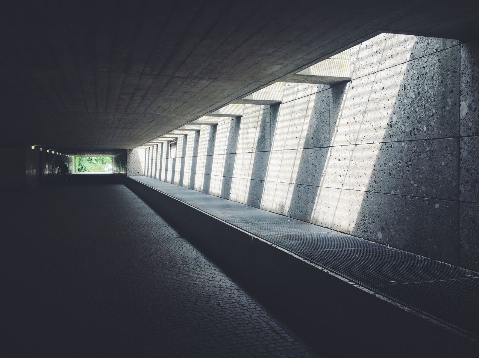 Dark minimal architectural corridor