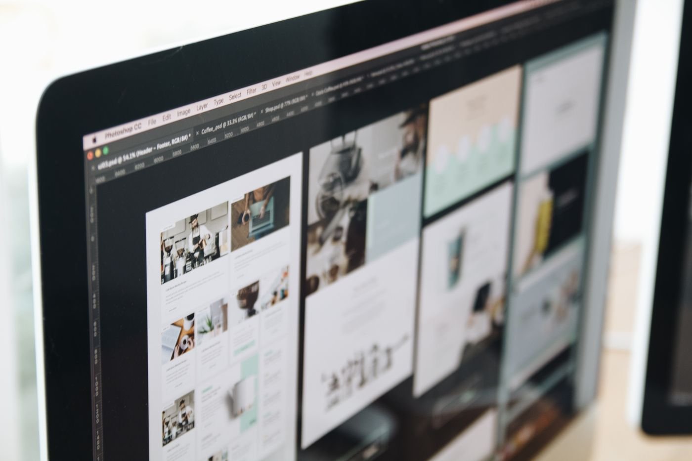 A colourful website interface being designed on screen